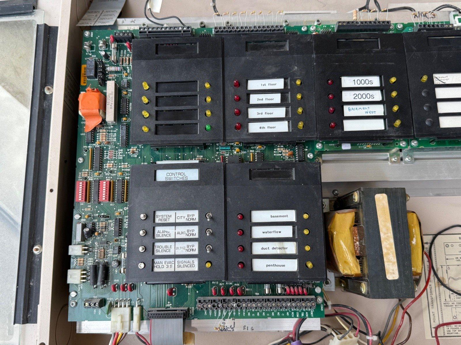 Fire alarm control panel circuit board with floor zone indicators and control switches