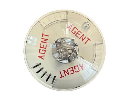 Agent fire alarm strobe light with clear cover and red lettering for emergency signaling