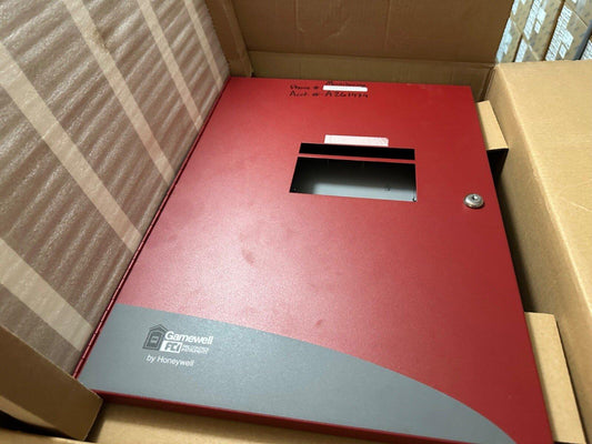 Red Gamewell fire alarm control panel by Honeywell in shipping box, used fire safety equipment