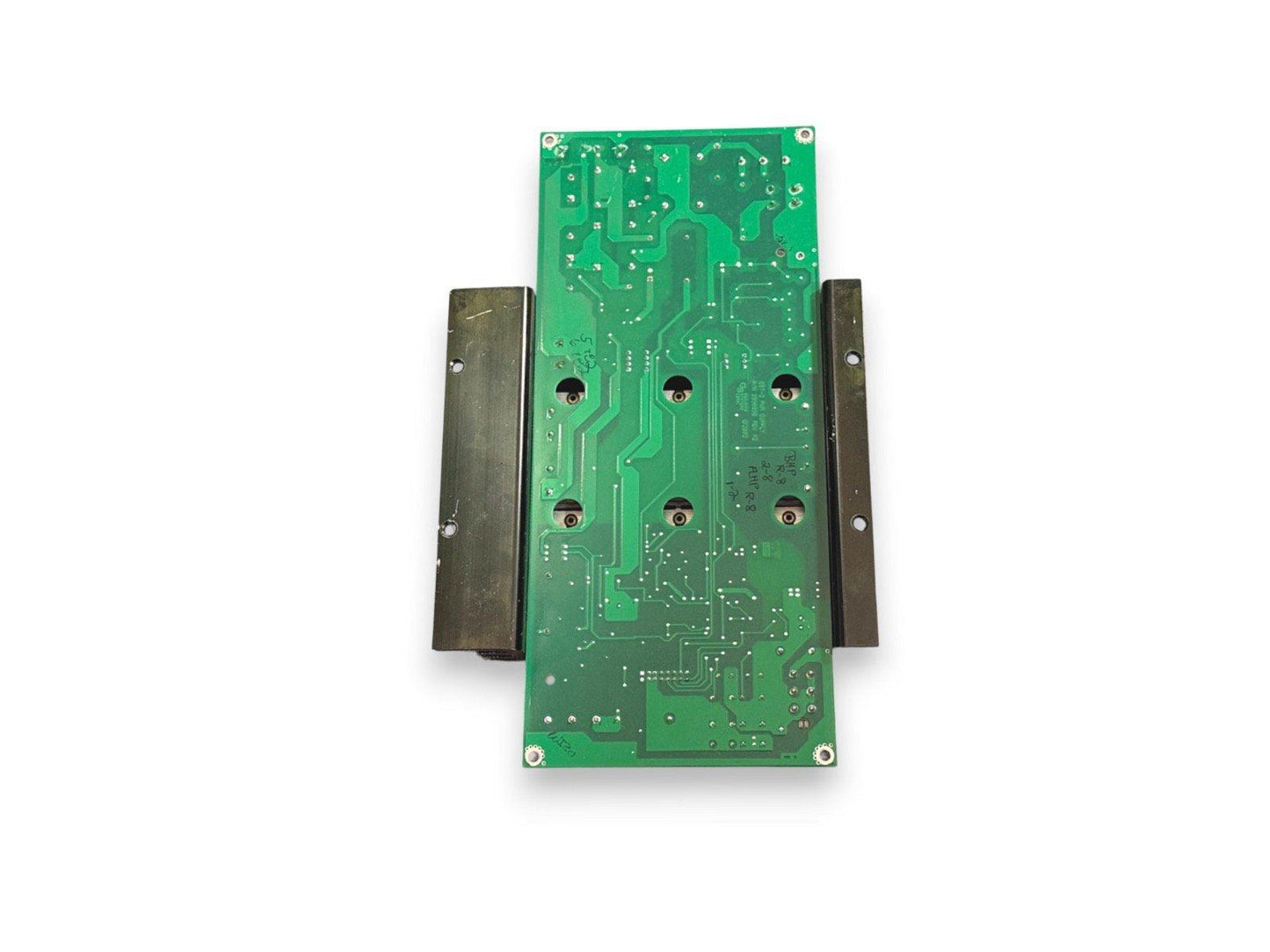 Green fire alarm control panel circuit board with metal mounting brackets
