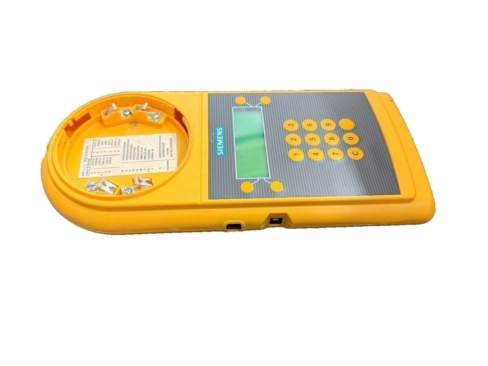 Yellow Siemens fire alarm control panel with keypad and LCD display for system testing and diagnostics