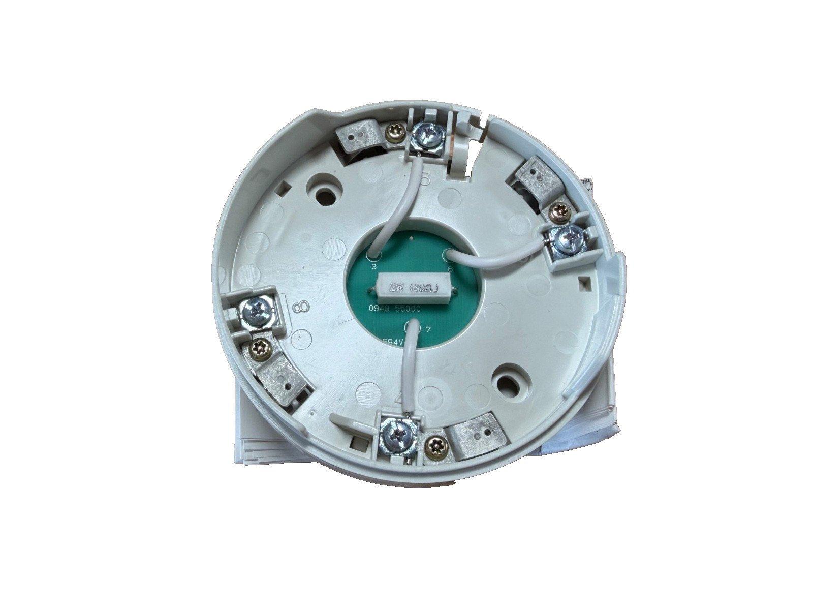Fire alarm base with wiring terminals and circuit board, compatible with smoke detectors