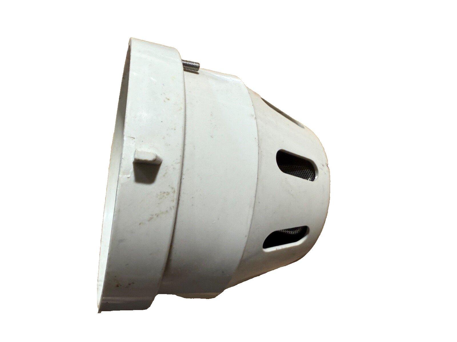 White fire alarm speaker with mounting screw and mesh vents for ceiling installation