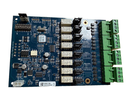 Fire alarm control panel circuit board with relays and green terminal blocks for zone monitoring