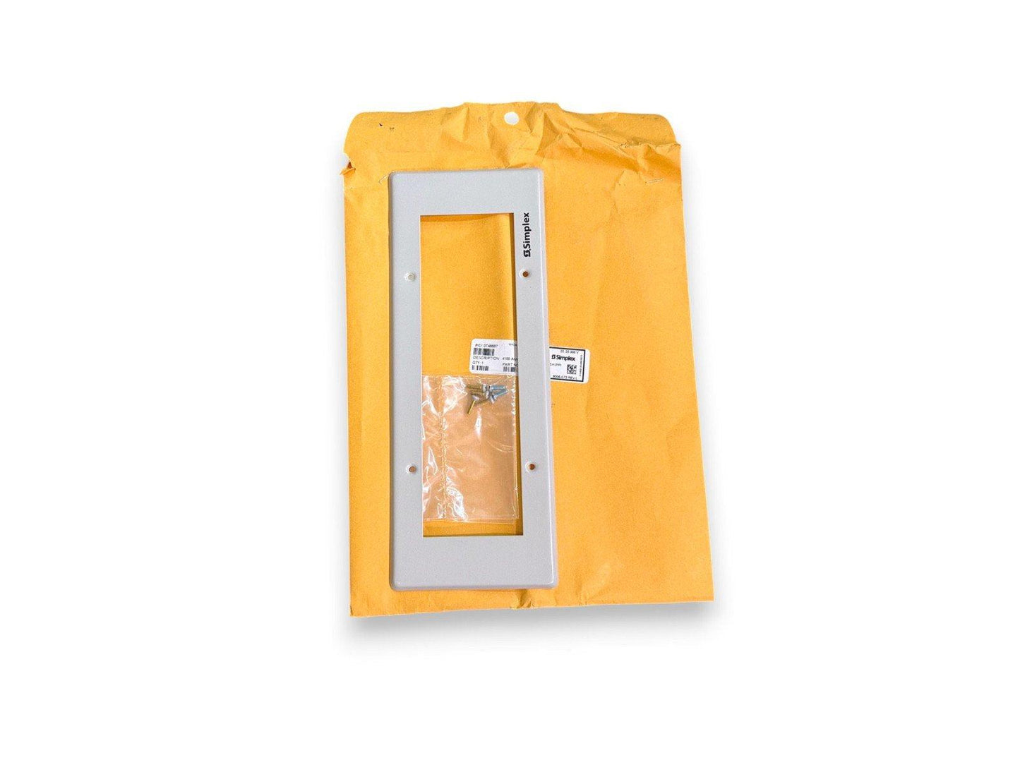 Simplex fire alarm panel cover with mounting hardware in yellow envelope, new surplus equipment