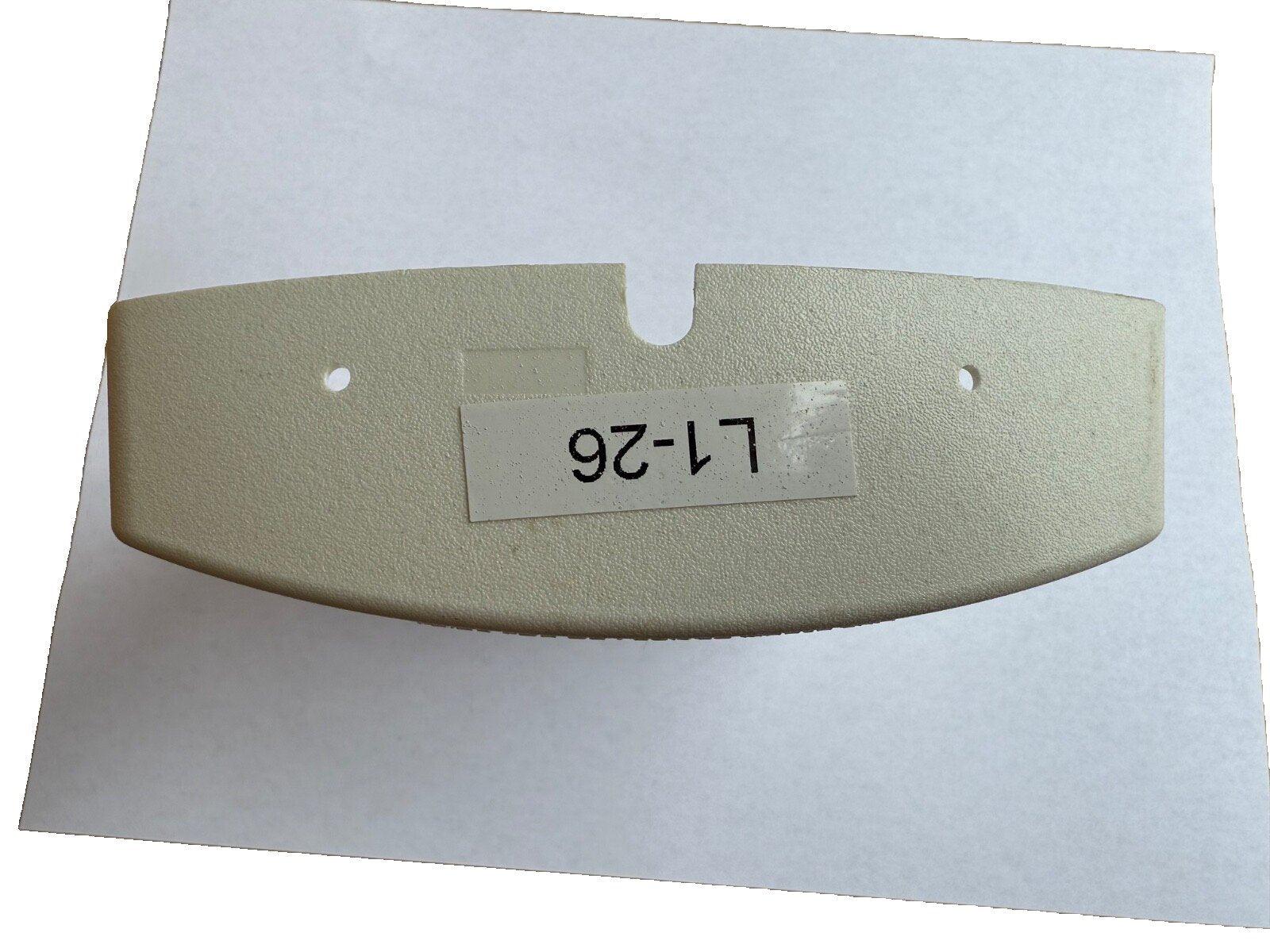 Beige fire alarm cover plate L1-26, textured surface with mounting holes, for fire safety equipment