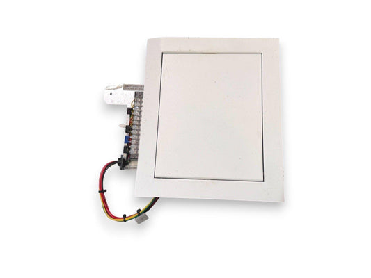 White fire alarm pull station with visible wiring and terminal block for commercial safety systems