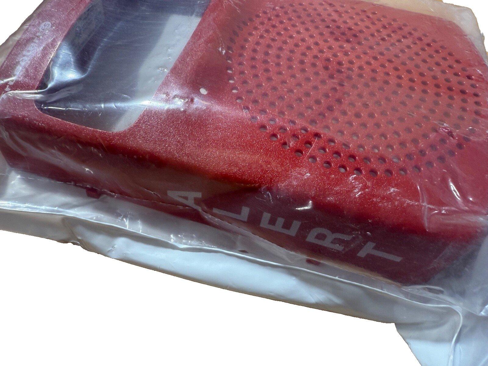 Red fire alarm horn speaker in plastic wrap, perforated cover, new surplus equipment