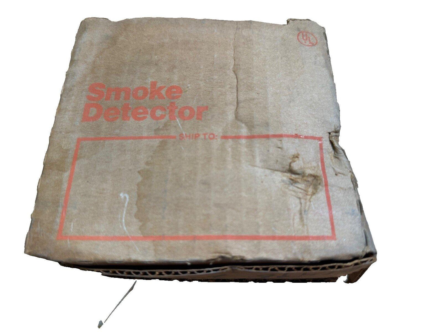 Used smoke detector in original cardboard box with UL mark, fire safety equipment