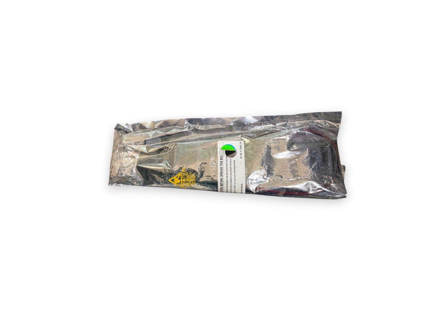Sealed fire alarm component in anti-static bag with warning label, ready for installation or replacement.