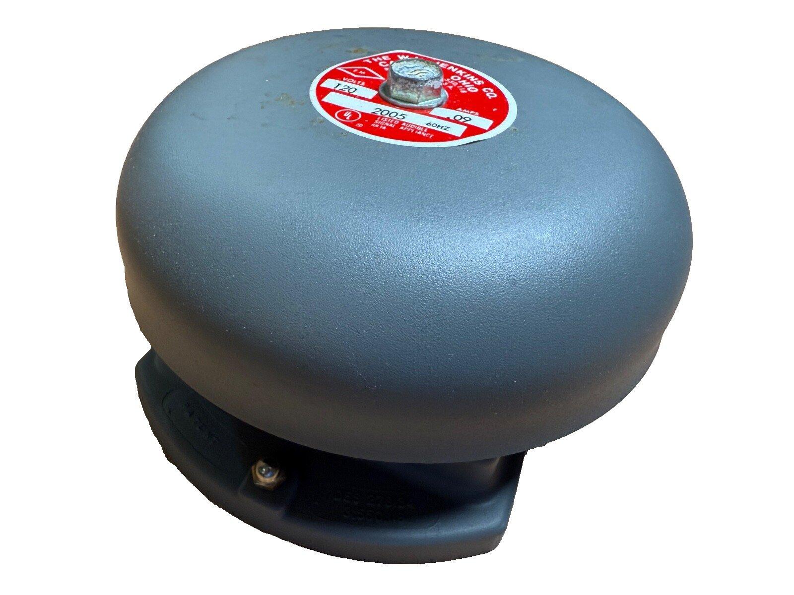 Used 120V fire alarm bell with red label, model 2005, for commercial fire safety systems