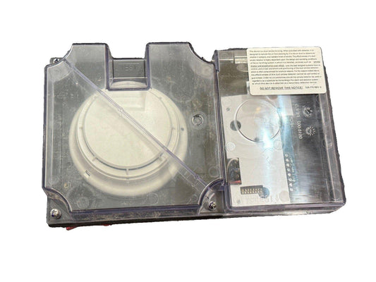 Duct smoke detector housing with test button and warning label for fire alarm systems