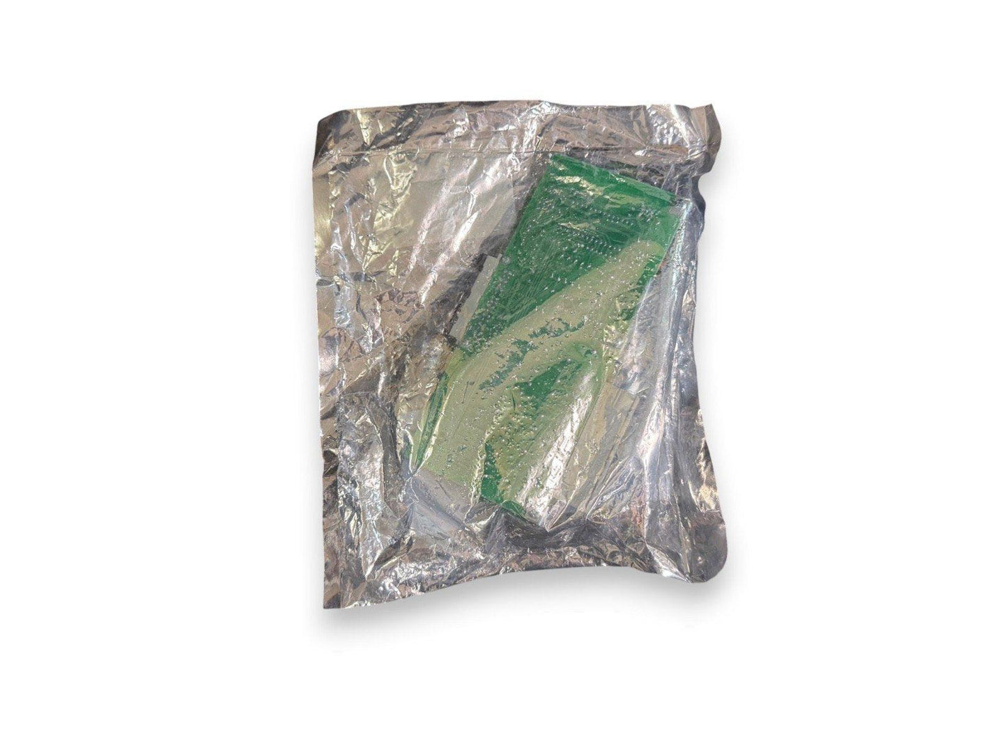 Green fire alarm control panel module in protective foil packaging