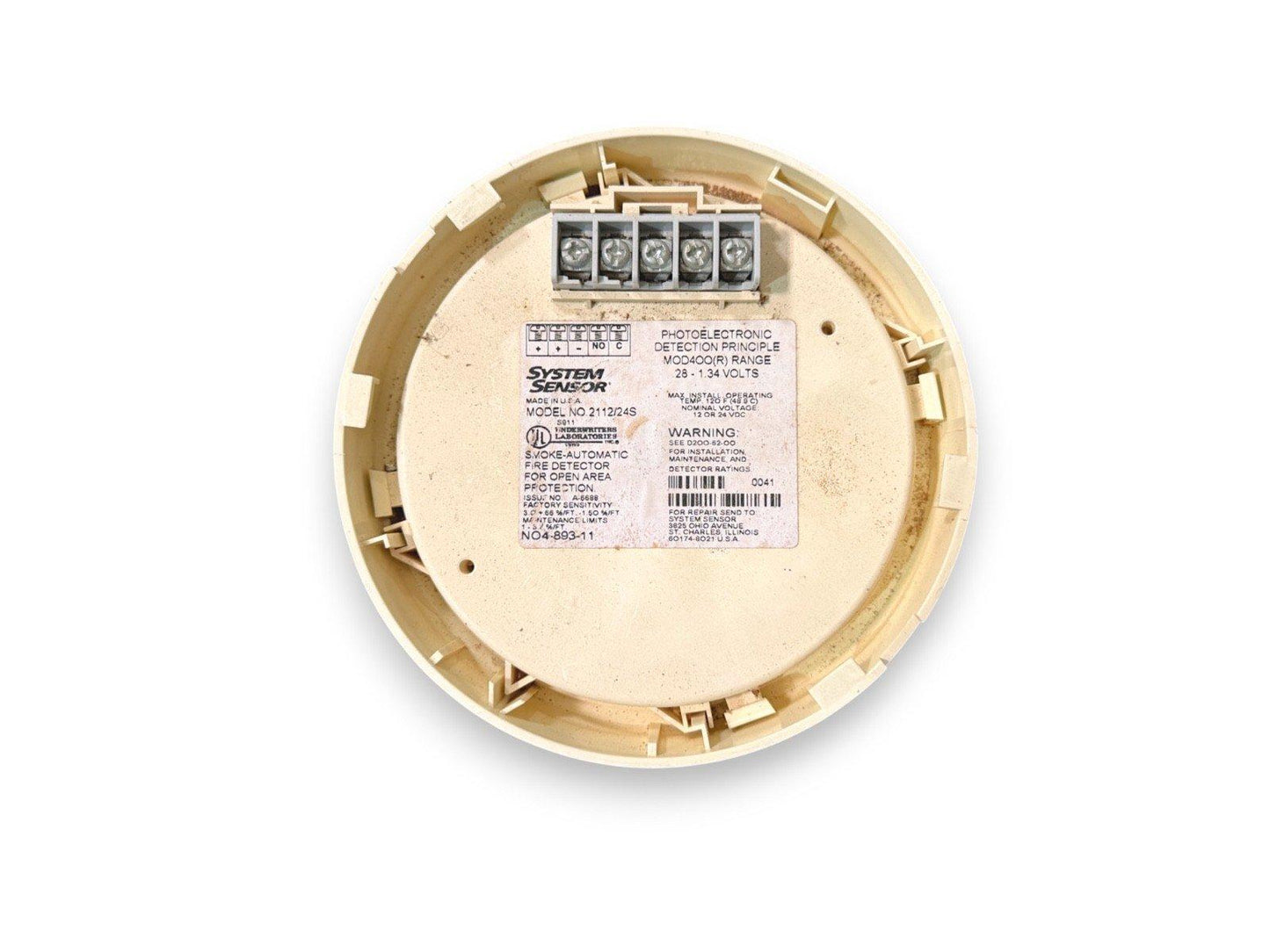 System Sensor smoke detector back view with wiring terminals and spec label for fire alarm systems