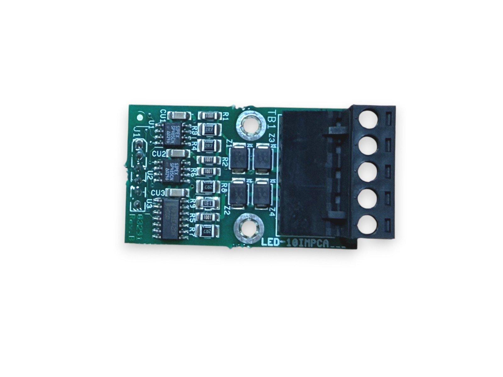 Green fire alarm control module circuit board with terminal block, labeled LED-10IMPCA for fire safety systems