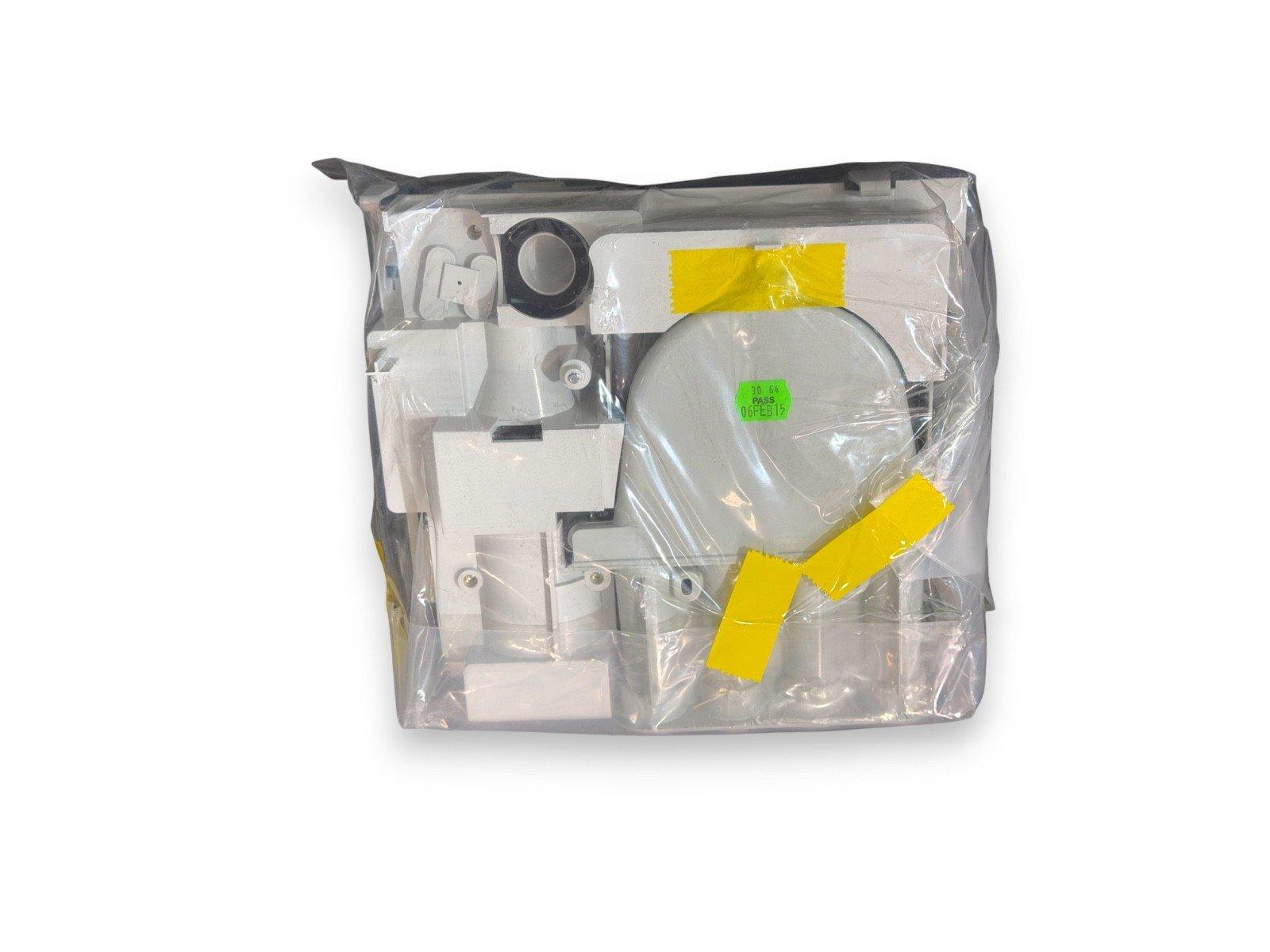 Sealed fire alarm equipment kit with white components and yellow tape, ready for installation