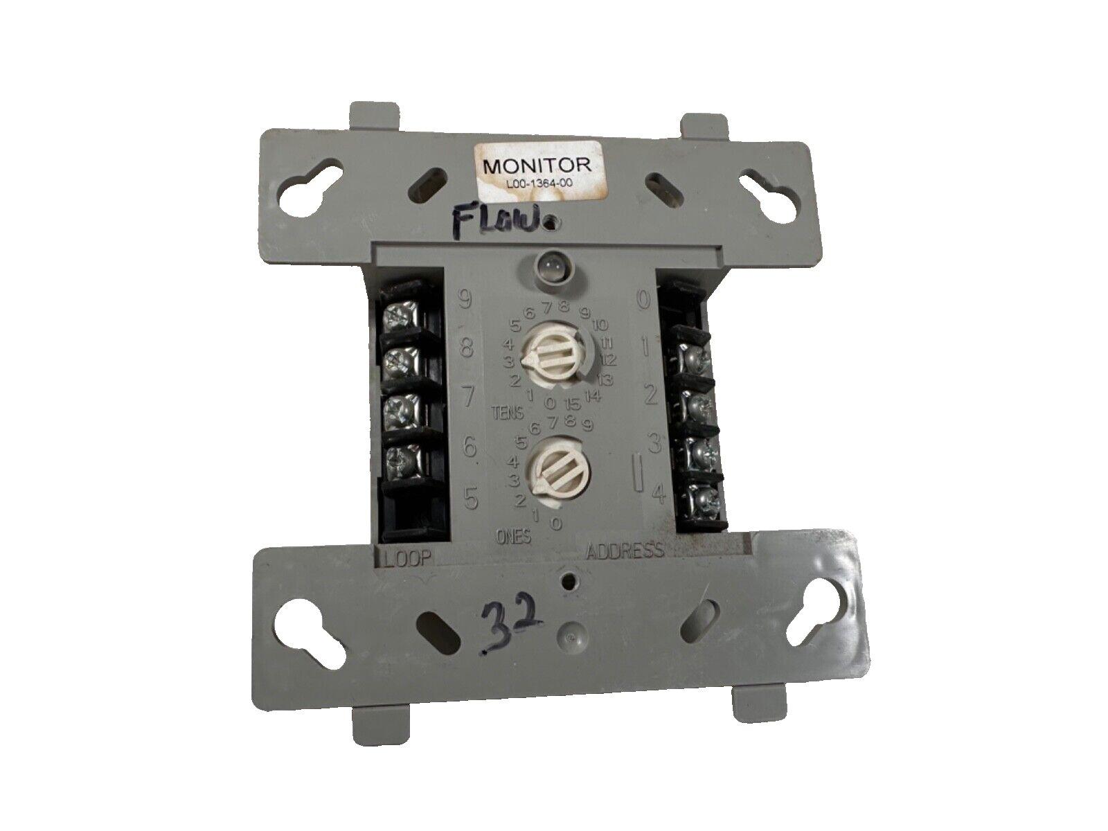 Used fire alarm monitor module with address dials and terminal connections, labeled L00-1364-00