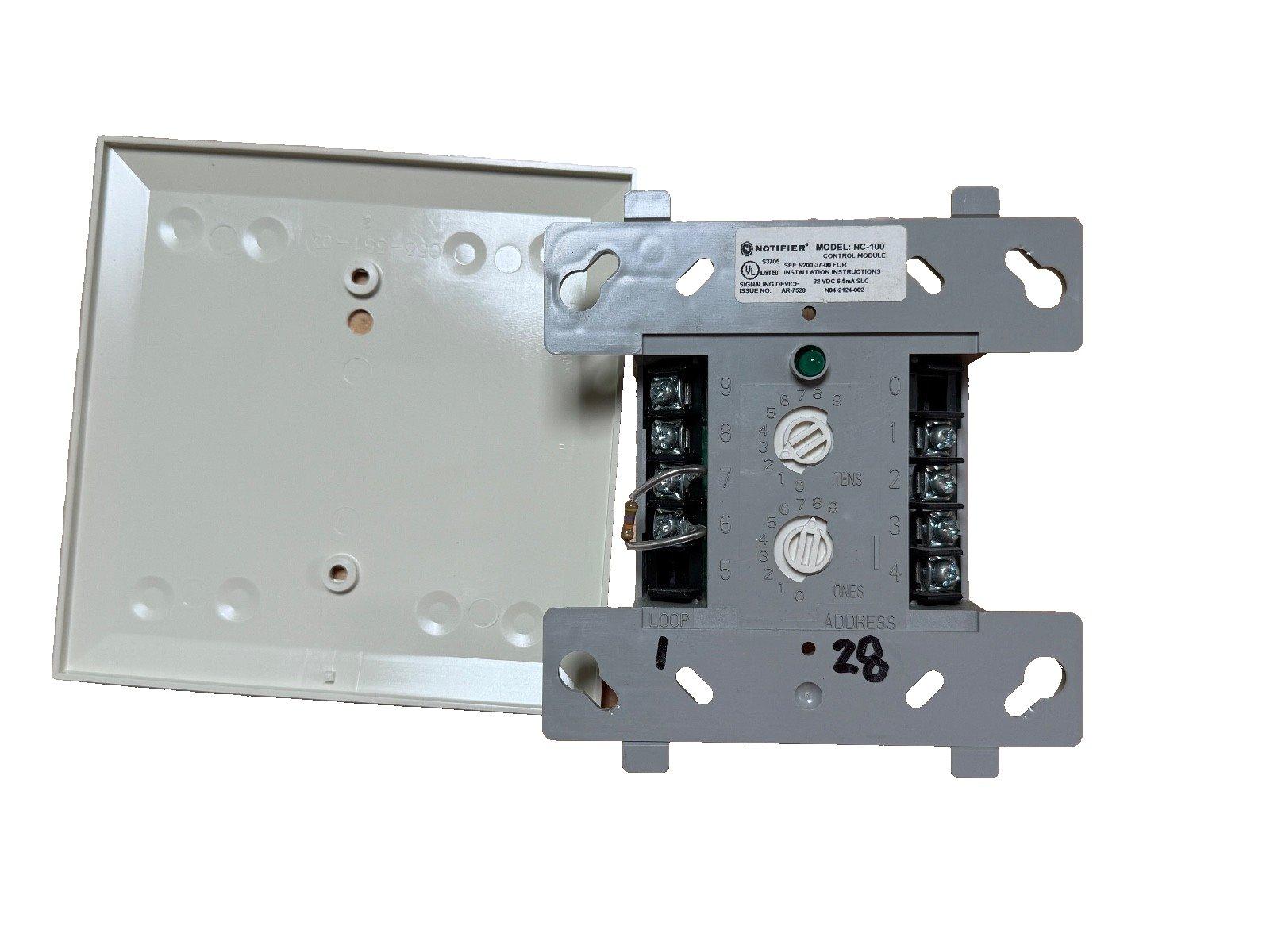 Notifier NC-100 fire alarm control module with address switches and terminal blocks for fire safety systems