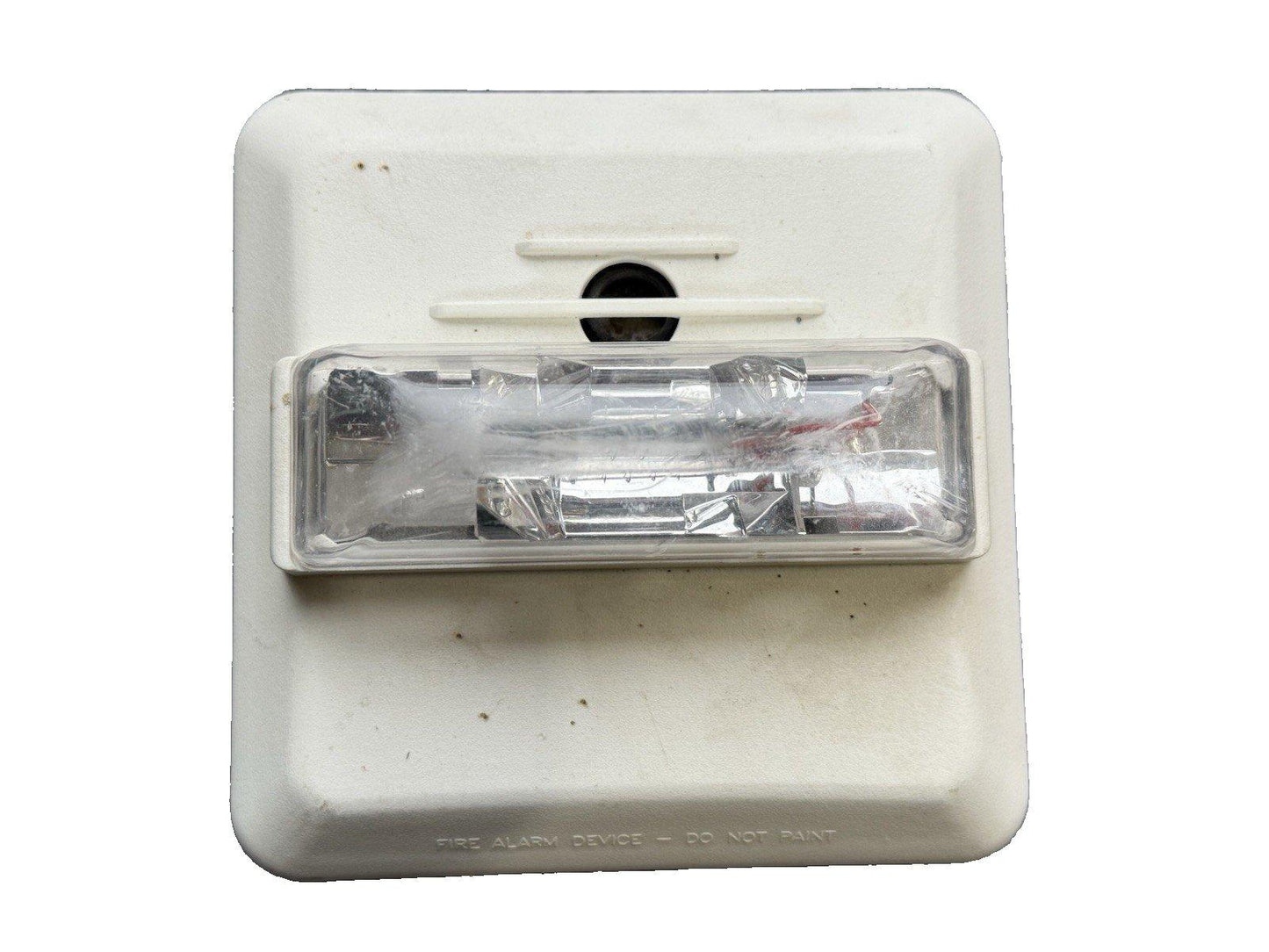 Used fire alarm strobe light with clear lens and warning text, for commercial safety systems