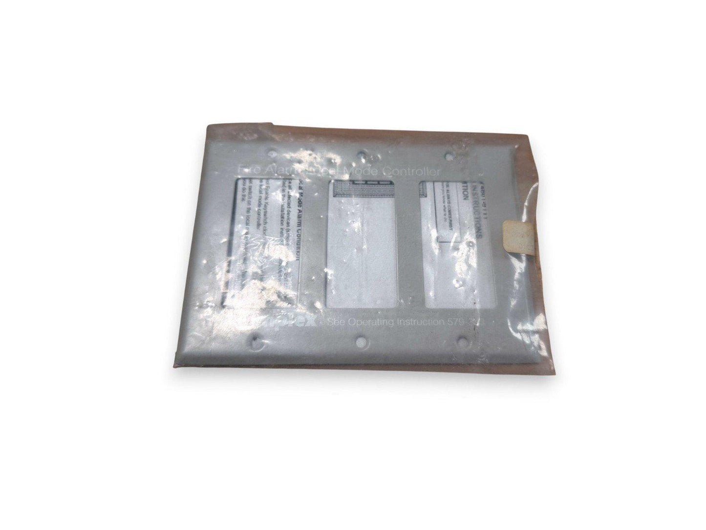 Fire alarm dual mode controller panel in protective packaging, used fire alarm equipment