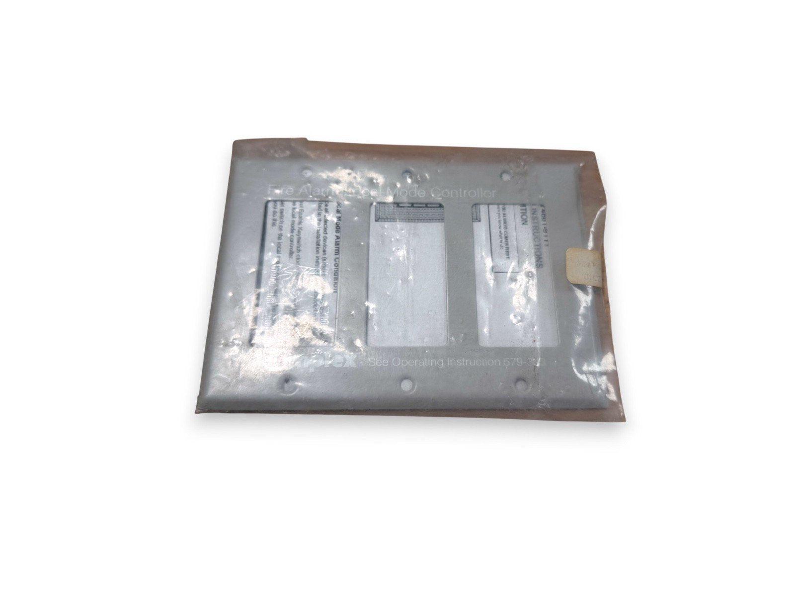 Fire alarm dual mode controller panel in protective packaging, used fire alarm equipment
