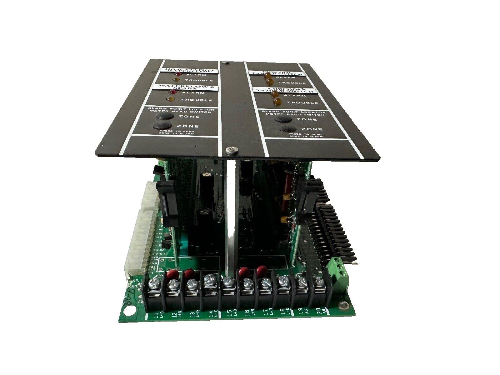 Fire alarm control module with zone indicators, alarm trouble lights, and terminal connections for fire safety systems