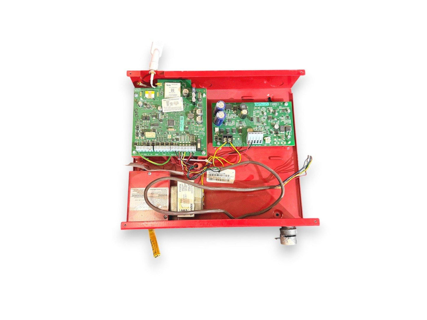 Red fire alarm control panel with exposed circuit boards and wiring for commercial fire safety systems
