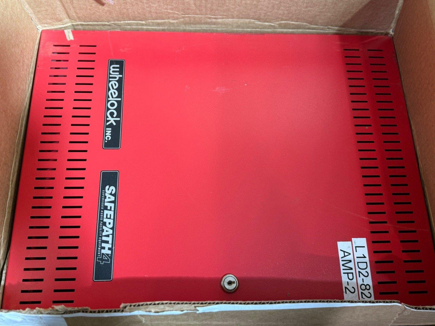 Red Wheelock Safepath 4 fire alarm amplifier in box, model AMP-2 L1D2-82