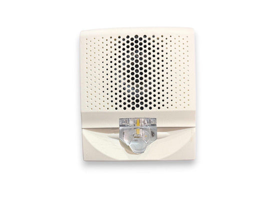 White fire alarm sounder with LED strobe light for commercial or residential safety systems