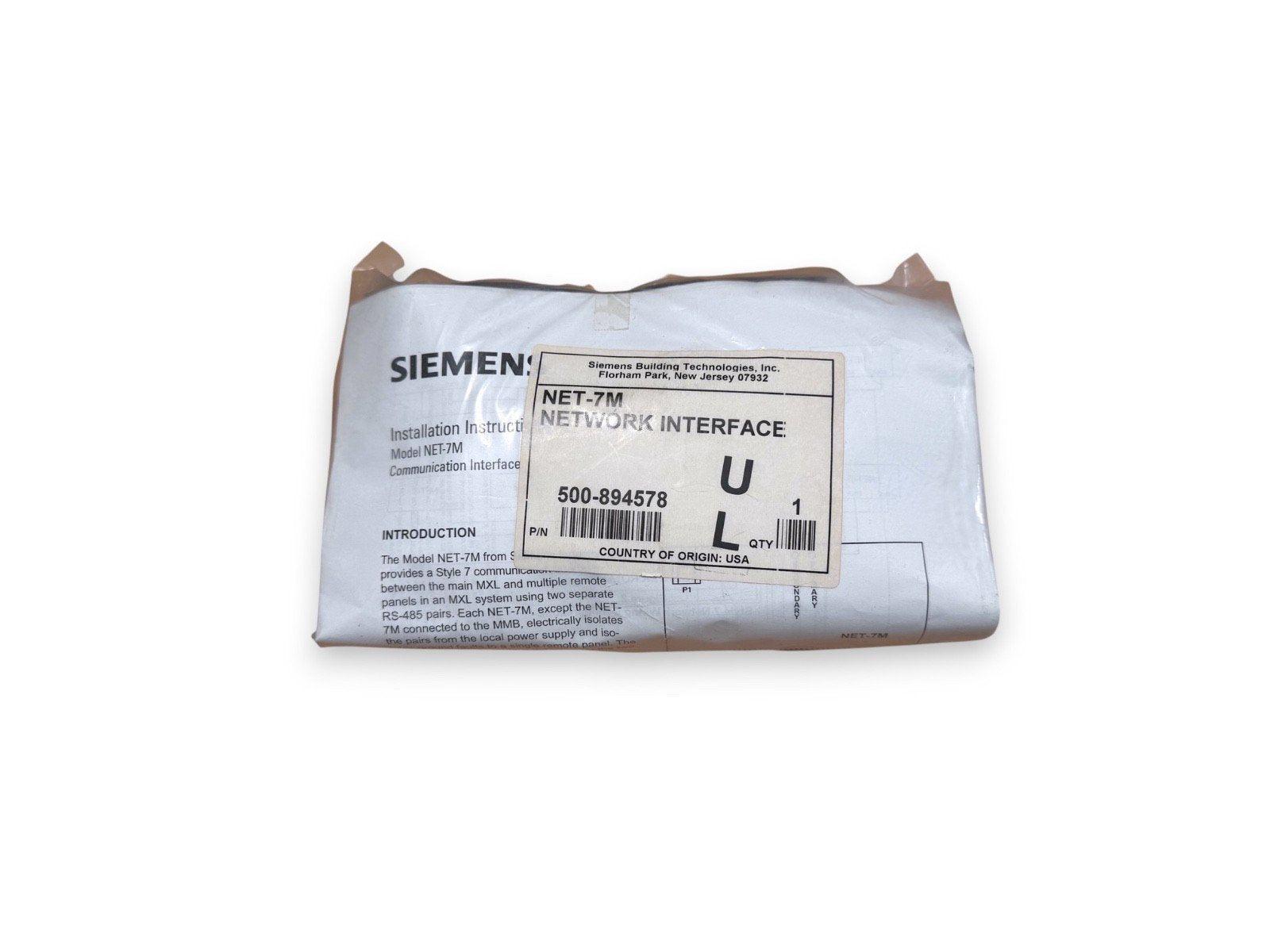 Siemens NET-7M network interface for fire alarm systems, model 500-894578, packaged with installation instructions