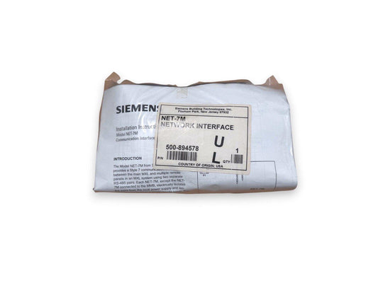 Siemens NET-7M network interface for fire alarm systems, model 500-894578, packaged with installation instructions