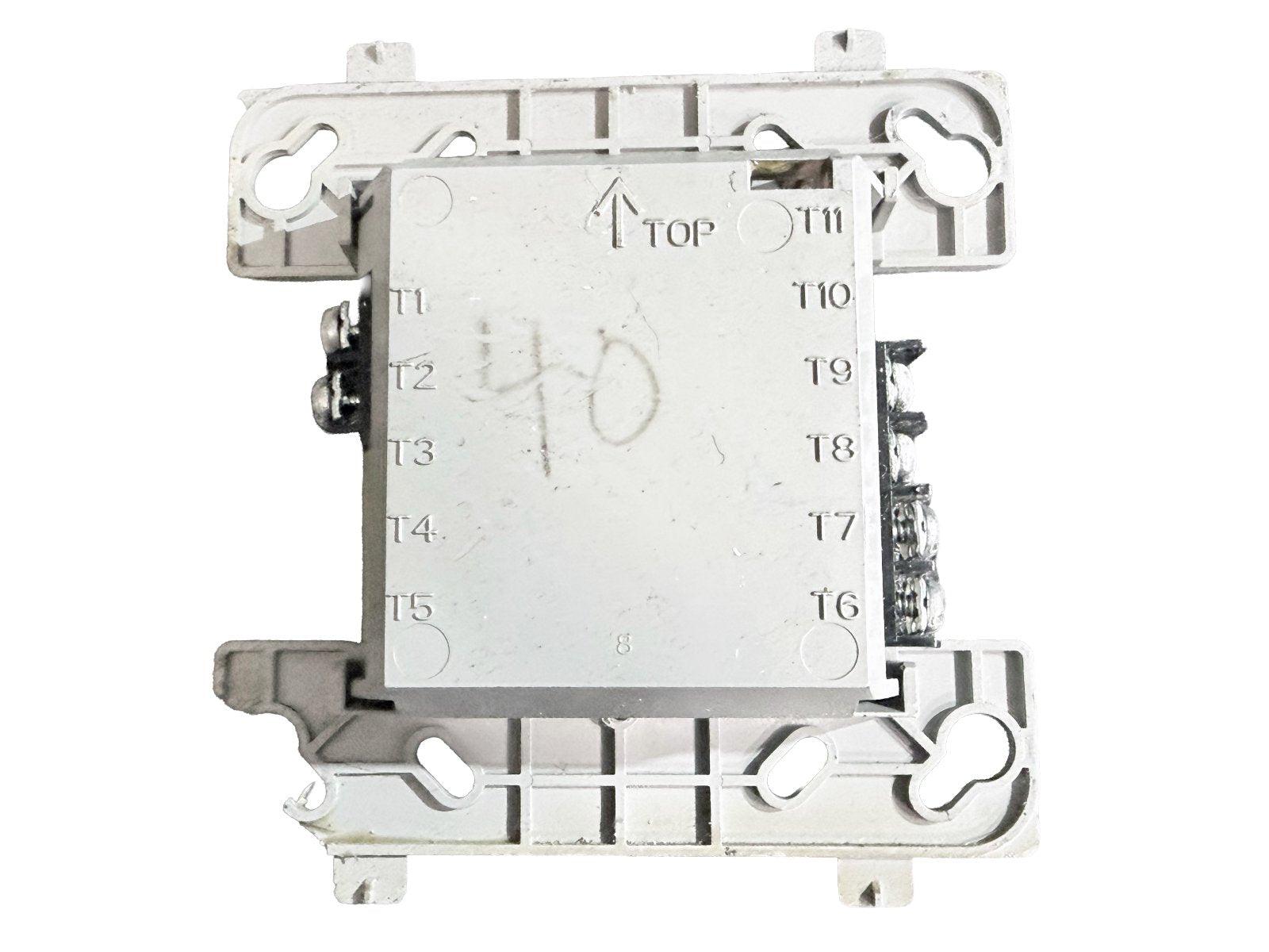 Fire alarm control module with terminal labels T1-T11, marked TOP for installation orientation