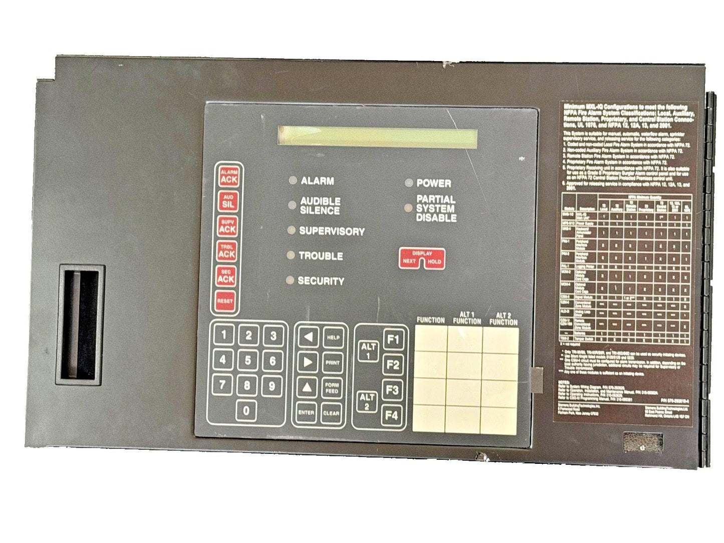 Fire alarm control panel with keypad, status indicators, and NFPA compliance label for commercial safety systems