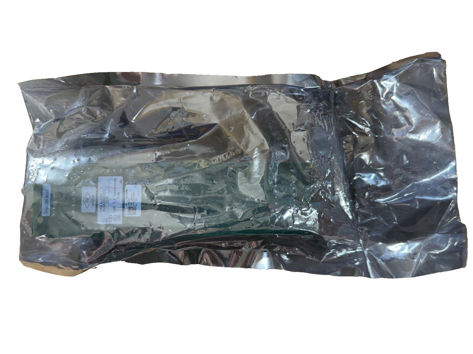 Sealed fire alarm control panel subassembly in anti-static bag, labeled for safety compliance
