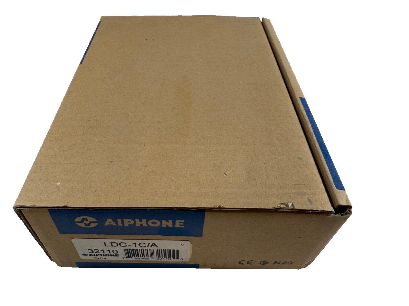 Aiphone LDC-1C/A fire alarm device in original packaging, model 32110, for commercial security systems.