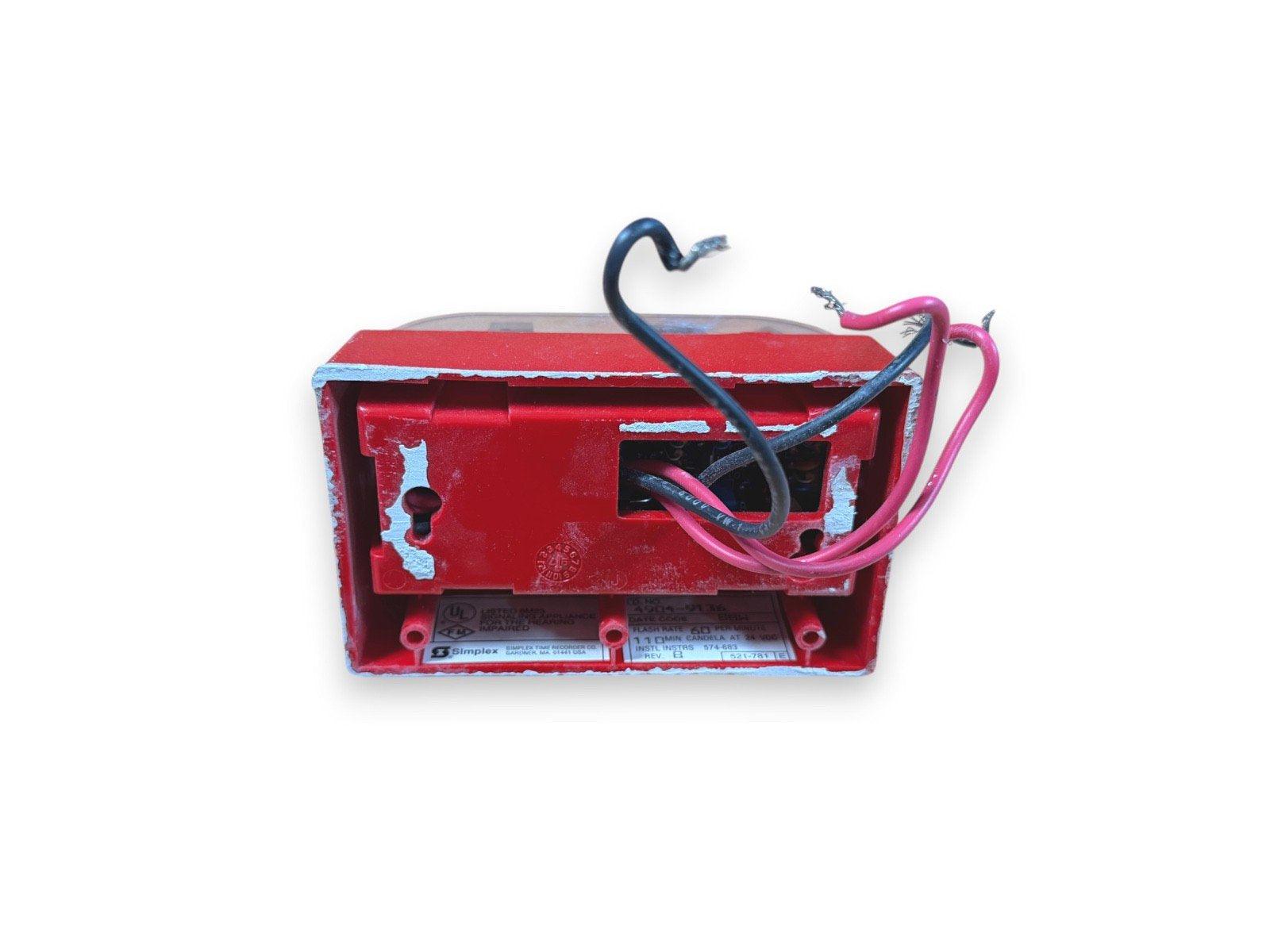 Red Simplex fire alarm strobe with wiring, used fire safety equipment