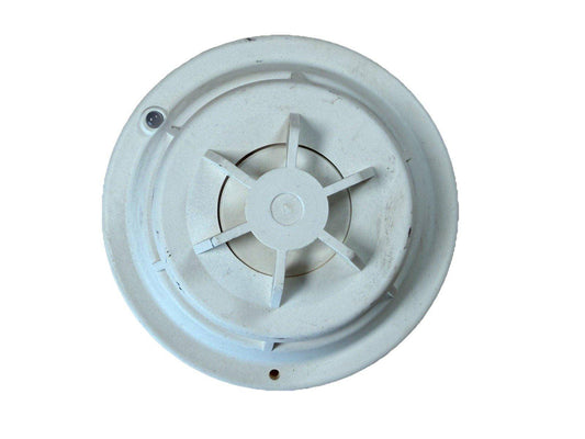 White ceiling-mounted fire alarm detector with radial vents and indicator light
