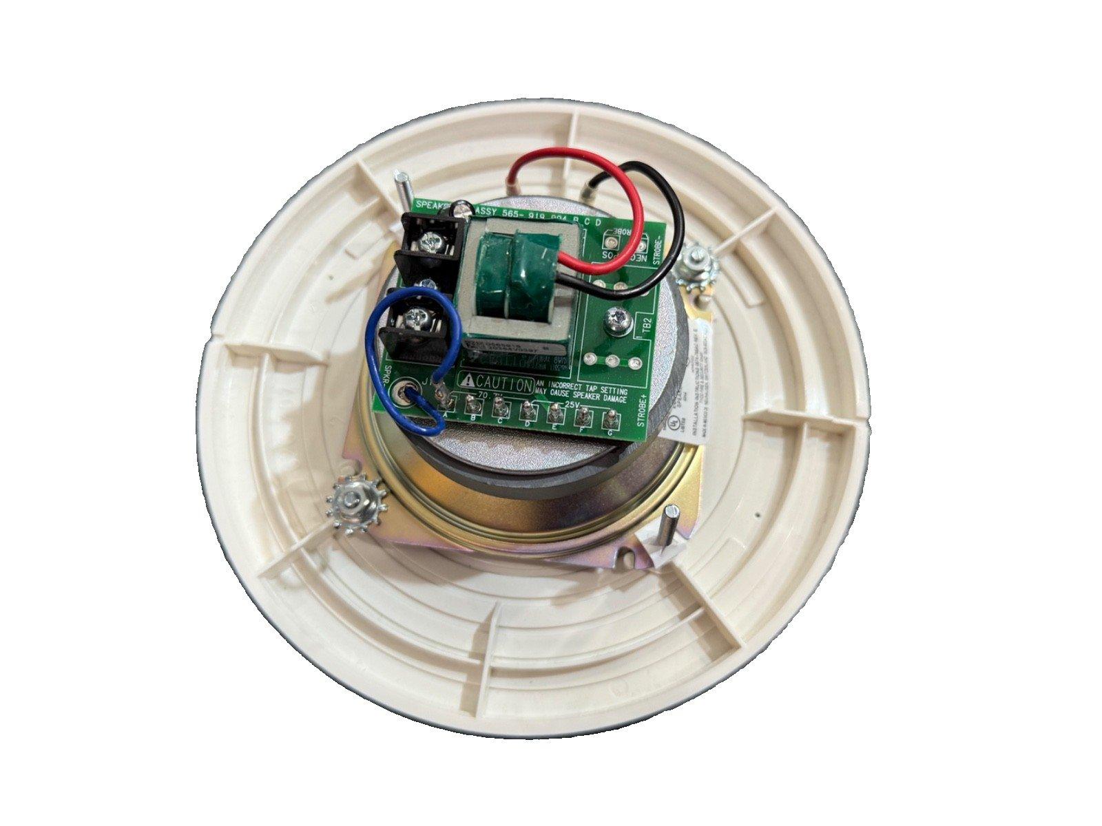 Fire alarm speaker strobe with wiring and circuit board, used in fire safety systems