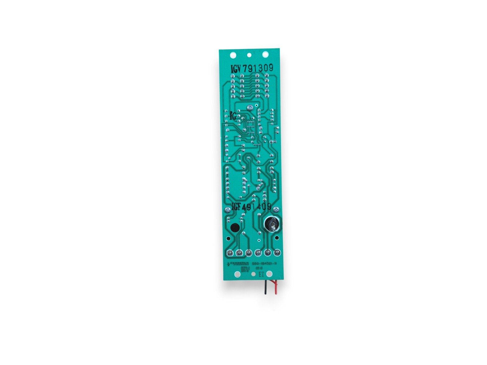 Green fire alarm circuit board with ICV 791309 label and red black wires for fire safety systems