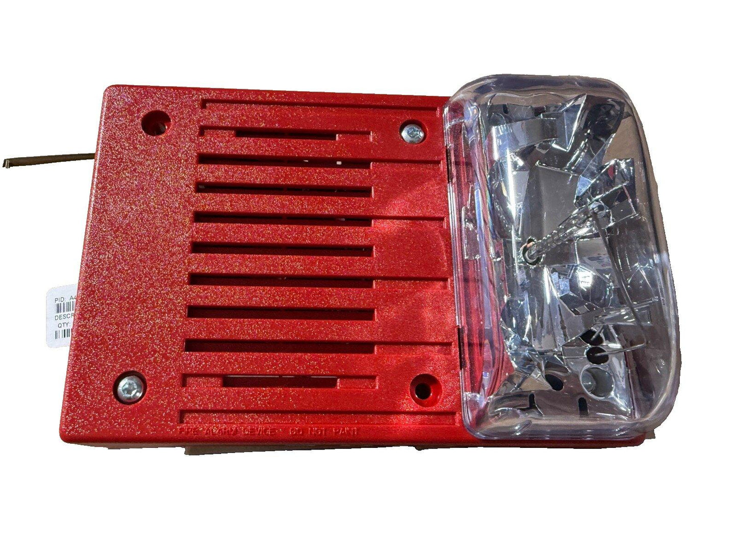 Red fire alarm horn strobe with clear lens, used fire alarm equipment