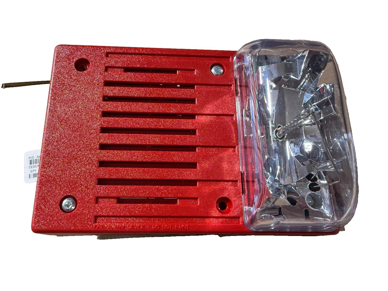 Red fire alarm horn strobe with clear lens, used fire alarm equipment