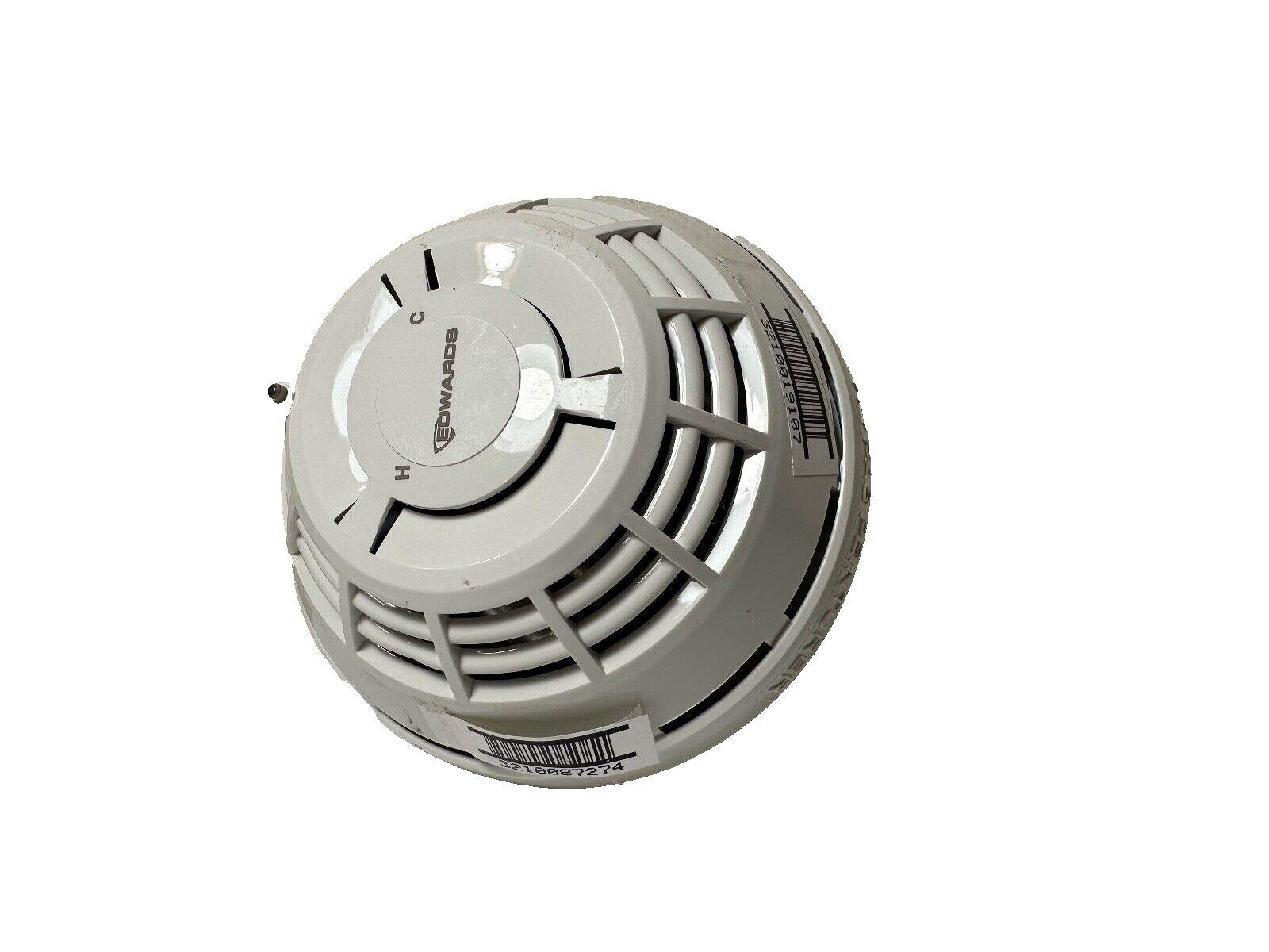 Edwards fire alarm smoke detector with barcode labels, white ceiling mount device