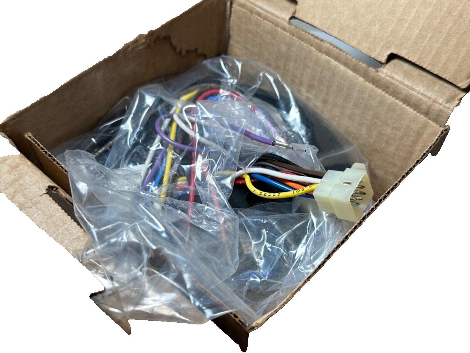 Fire alarm wiring harness with multi-colored cables and connector in box