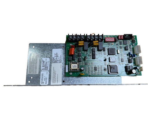Fire alarm control panel circuit board with connectors and components for commercial systems