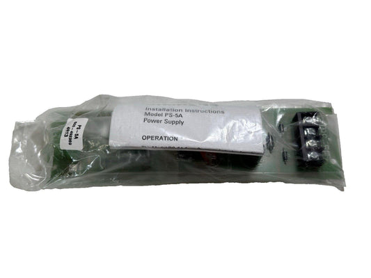 Model PS-5A fire alarm power supply with installation instructions, sealed in plastic packaging