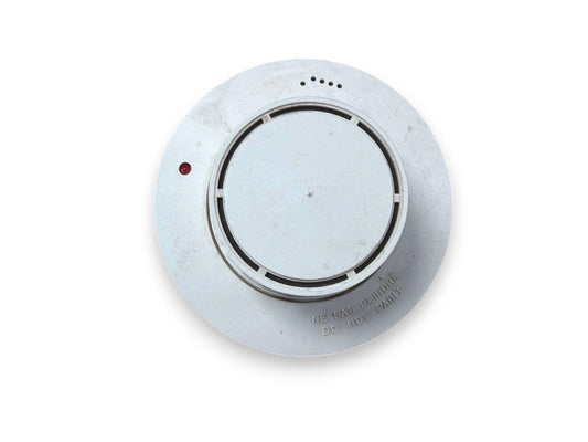 White ceiling-mounted smoke detector with red LED, labeled 'Do Not Paint' for fire alarm systems