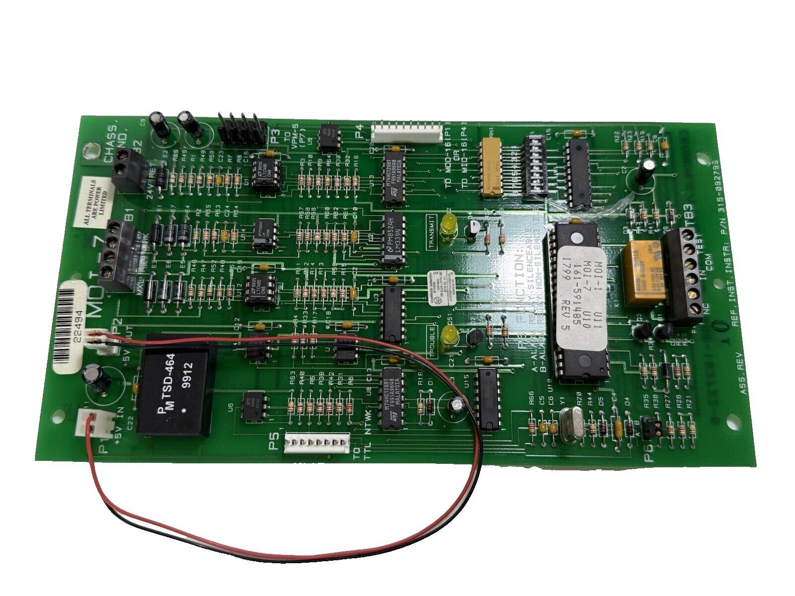 Fire alarm control panel circuit board with resistors, ICs, and connectors for fire safety systems