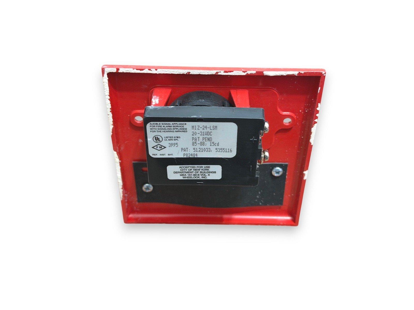 Red fire alarm strobe with UL listed audible signal device for hearing impaired, model MIZ-24-LSM